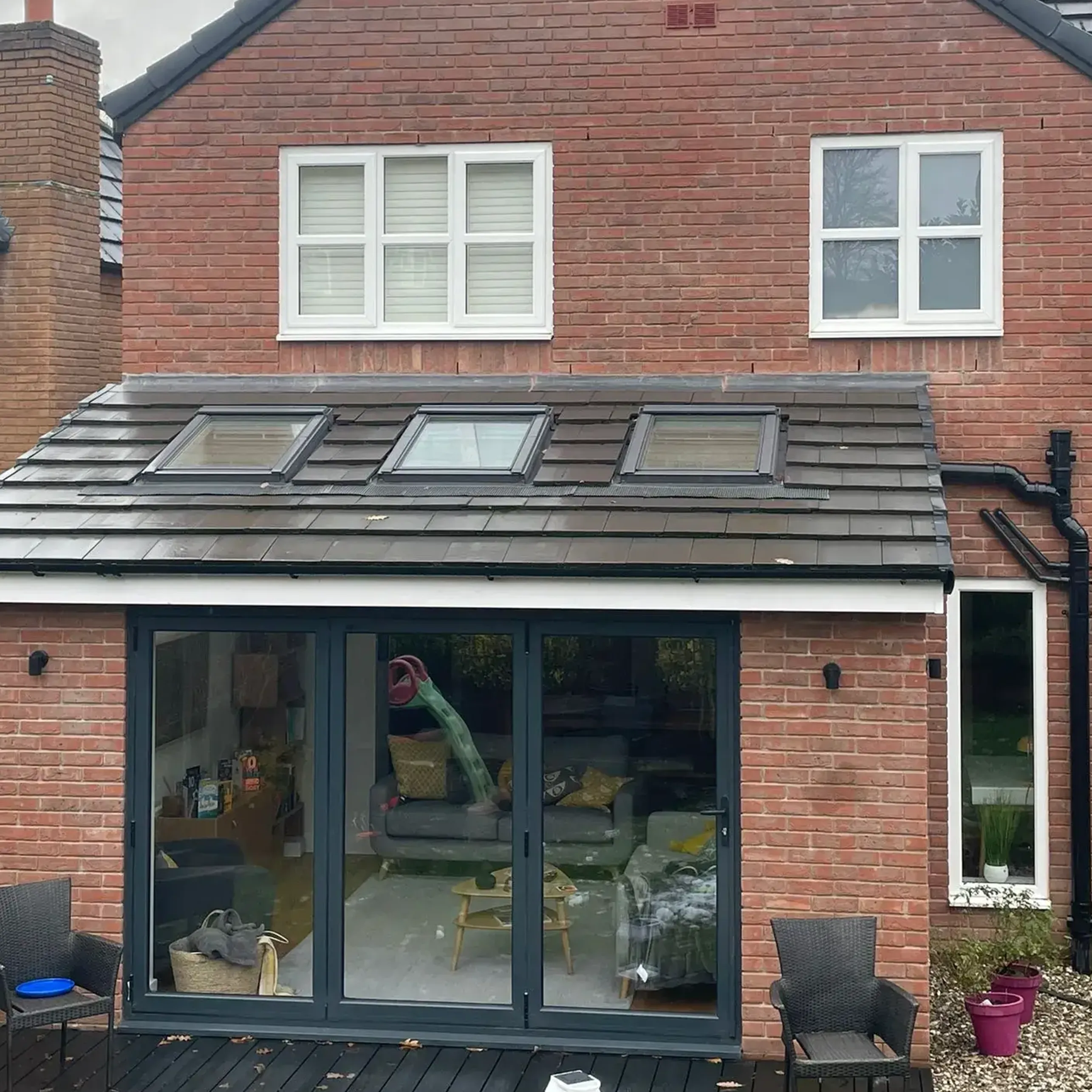 A house with a patio and patio furniture.